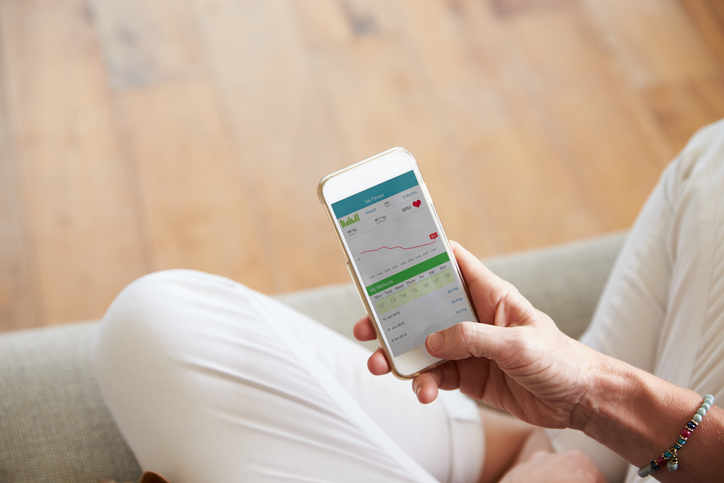 Woman Looking At Health Monitoring App On Smartphone Startlap Vásárlás