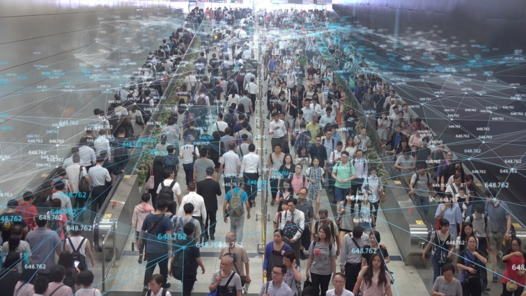 Egy hongkongi vasútállomáson átmenő tömeg által kibocsátott digitális jelek ábrája.