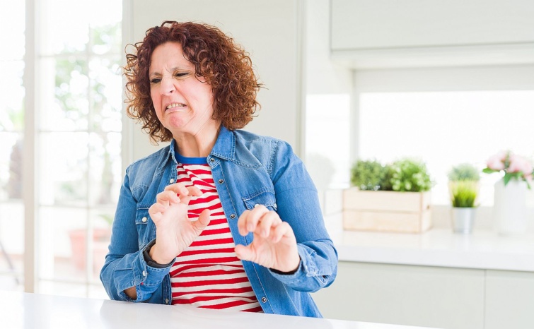 Middle age senior woman with curly hair wearing denim jacket at home disgusted expression displeased and fearful doing disgust face because aversion reaction With hands raised Annoying concept Startlap Vásárlás
